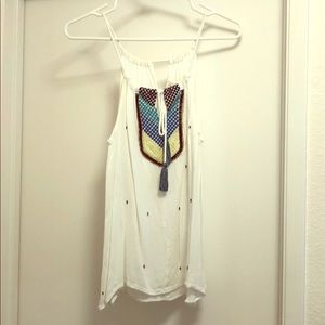Flowy white halter top with beading detail